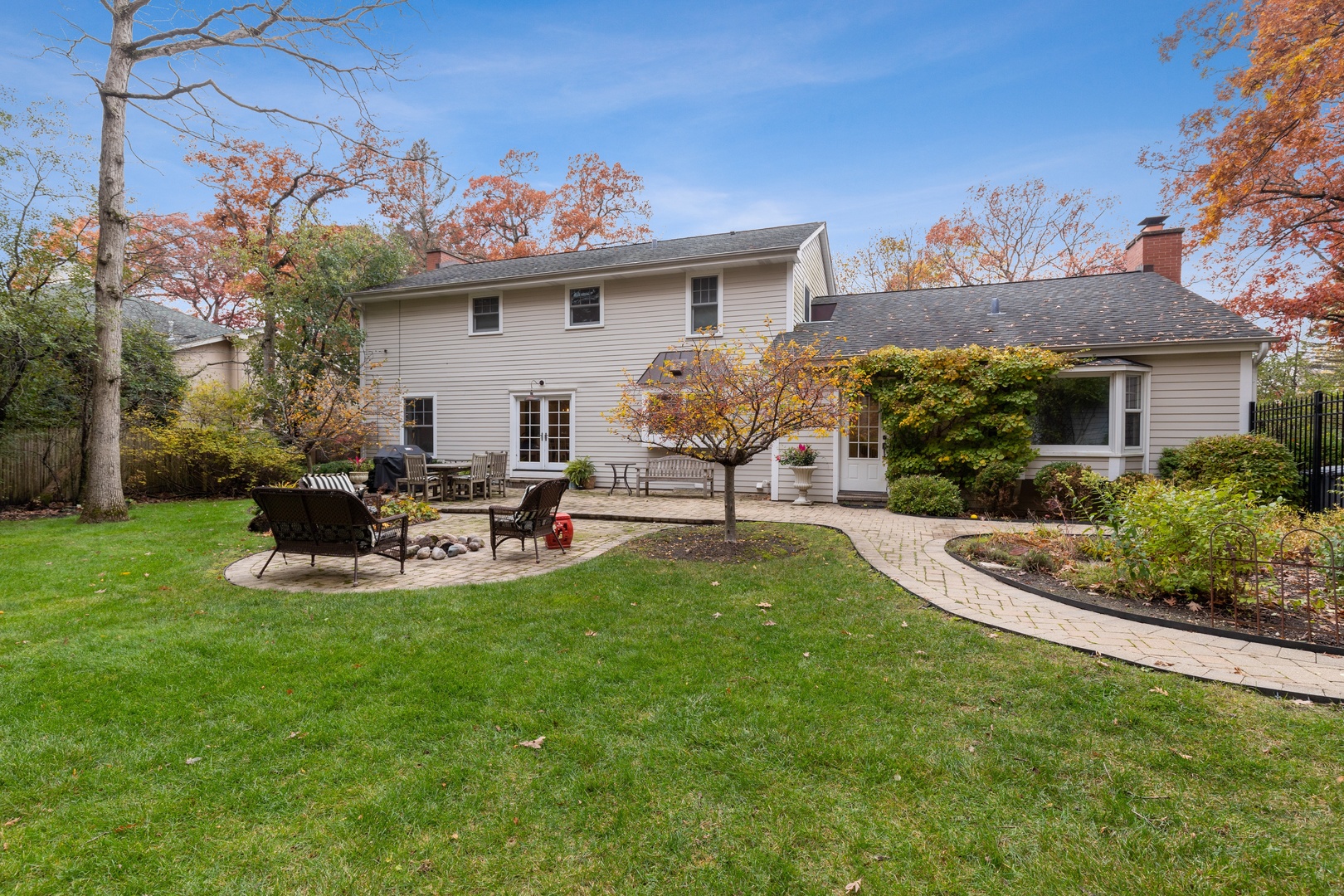 649 Forest Hill Road Lake Forest, IL 60045 - Photo 23 of 23 a view of a house with backyard and sitting area