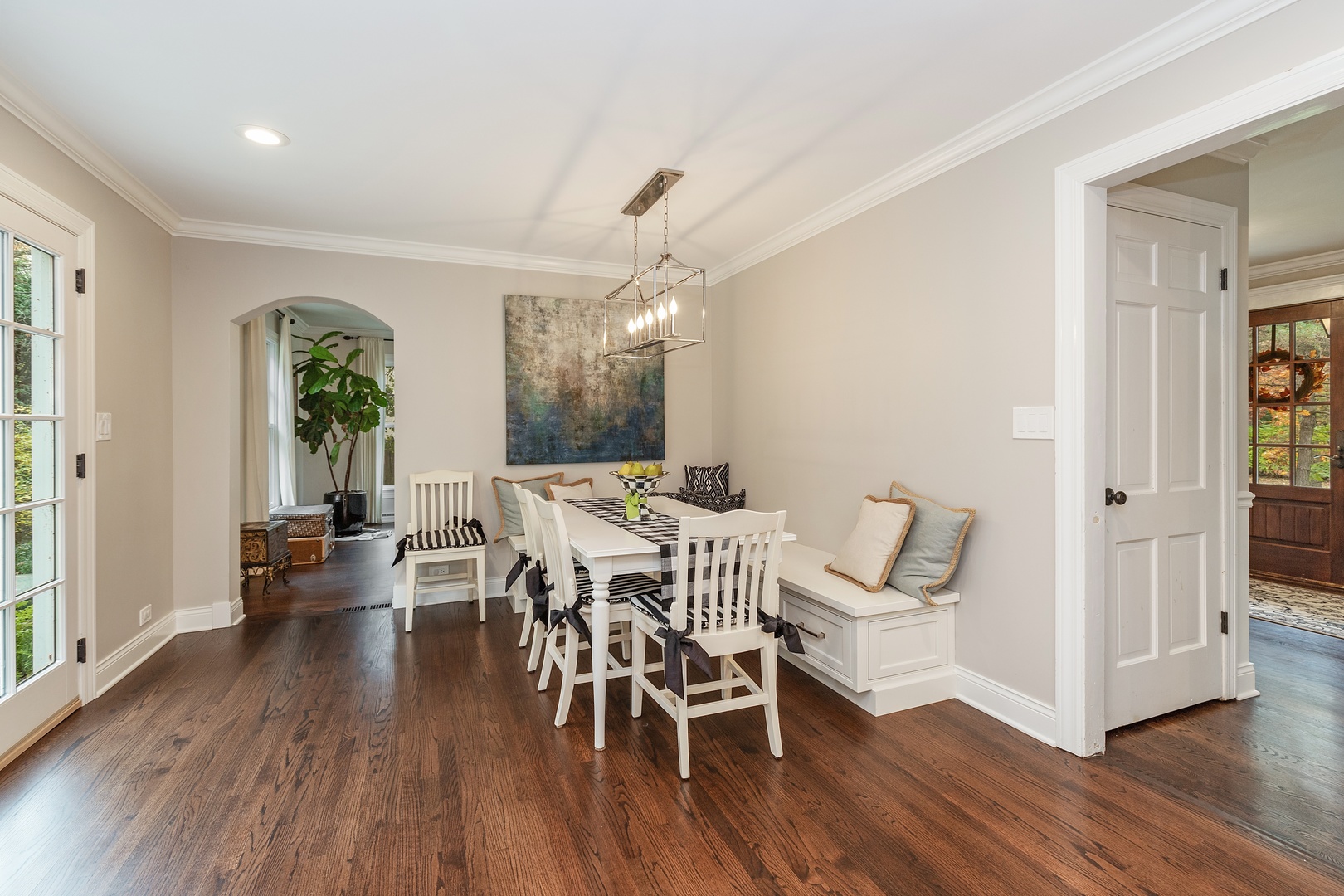 649 Forest Hill Road Lake Forest, IL 60045 - Photo 8 of 23 a view of a dining room with furniture and wooden floor