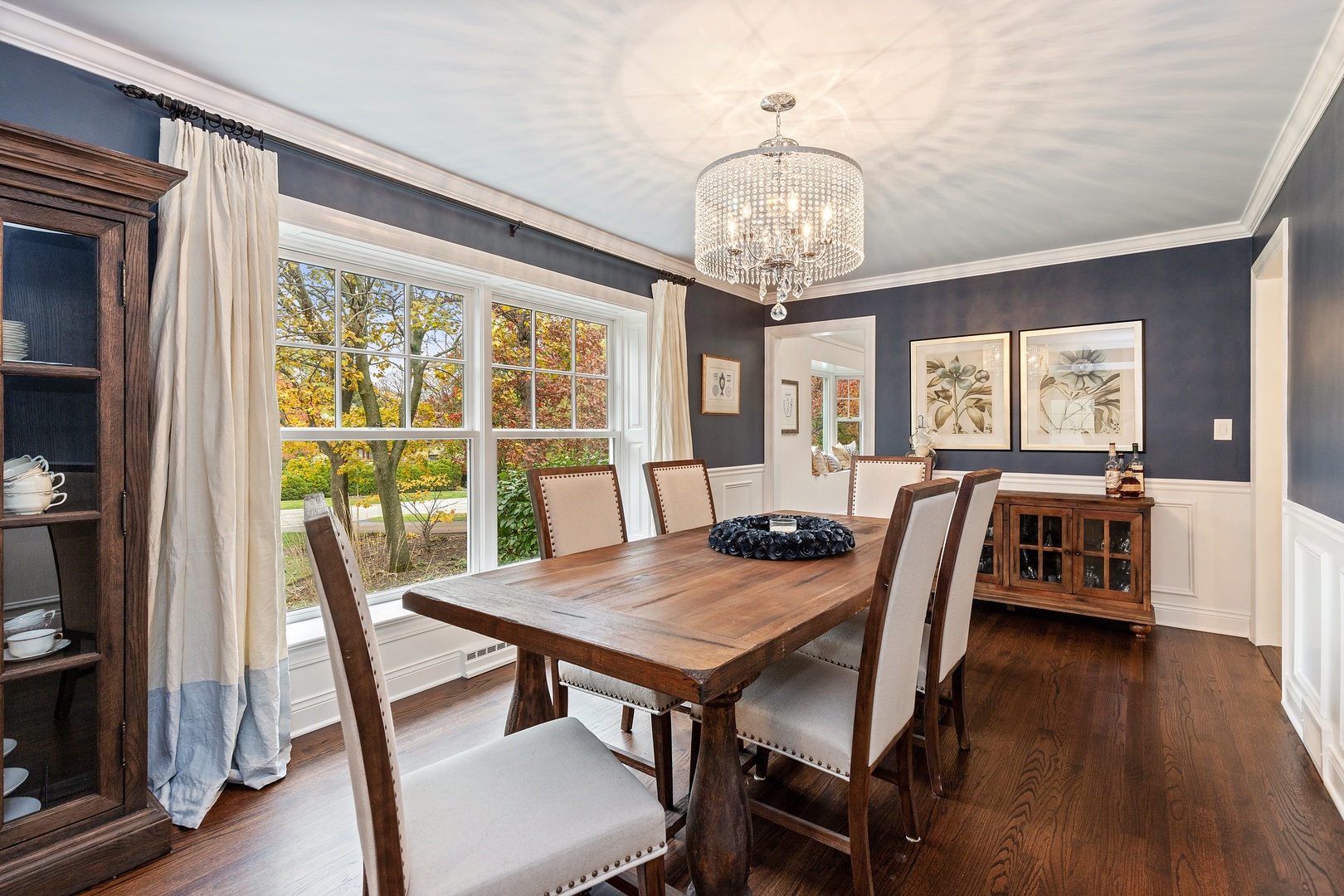 649 Forest Hill Road Lake Forest, IL 60045 - Photo 9 of 23 a view of a dining room with furniture window and wooden floor