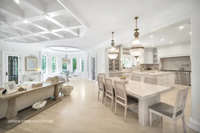 a bathroom with a toilet a sink and a window