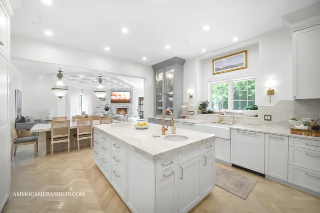 a spacious bedroom with a large bed and a large window