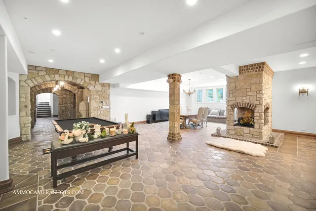 a view of a house with swimming pool and sitting area