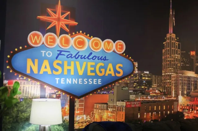 a front door with sign board