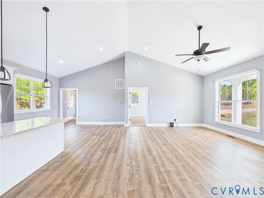 6795 Darlington Heights Road Cullen, VA 23934 - Photo 5 of 44 Unfurnished living room featuring a high ceiling,