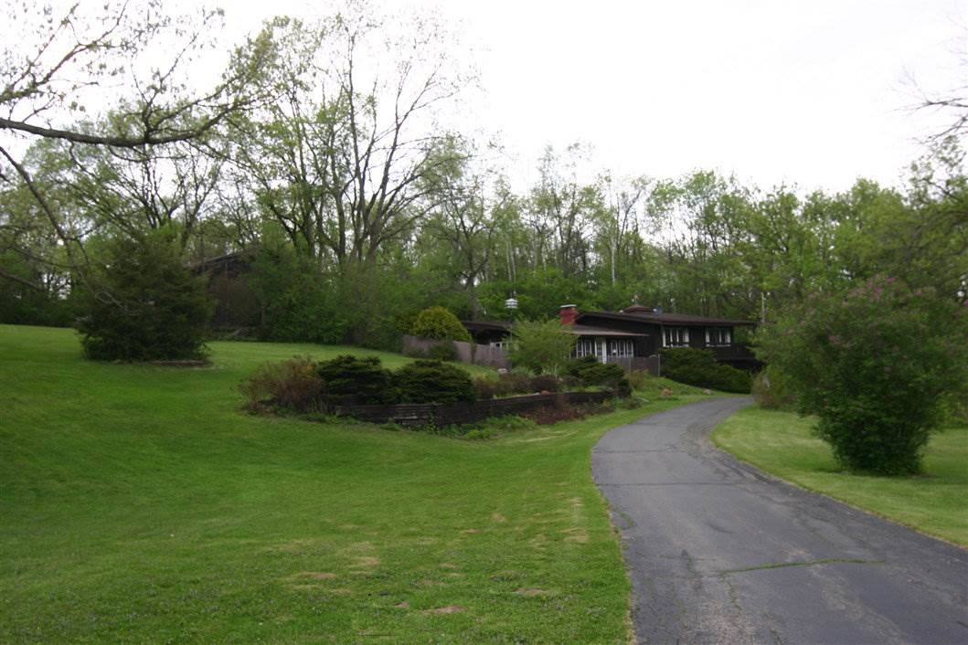 5969 Fitzgerald Road Rockford, IL 61102 - Photo 1 of 25 a view of a garden with plants