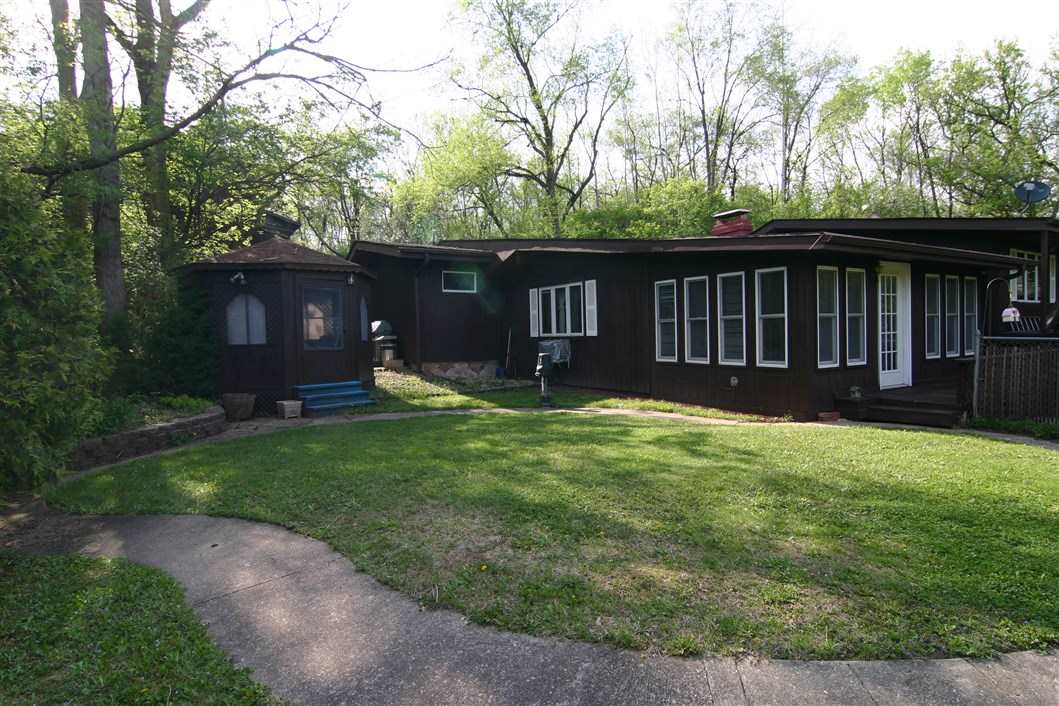 5969 Fitzgerald Road Rockford, IL 61102 - Photo 5 of 25 a view of a deck in the backyard