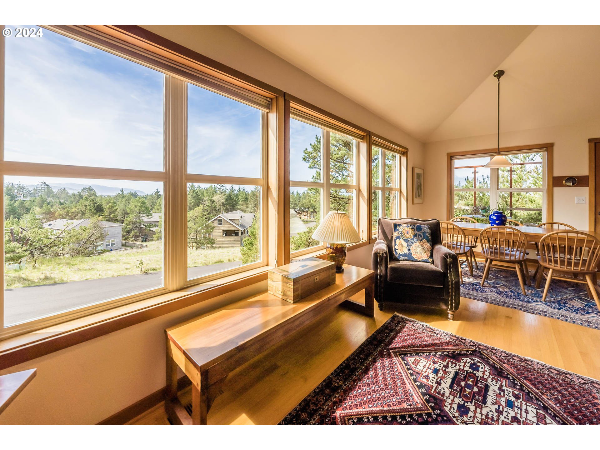 Ridge Road Pacific City, OR 97135 - Photo 14 of 34 a living room with furniture a table and large windows