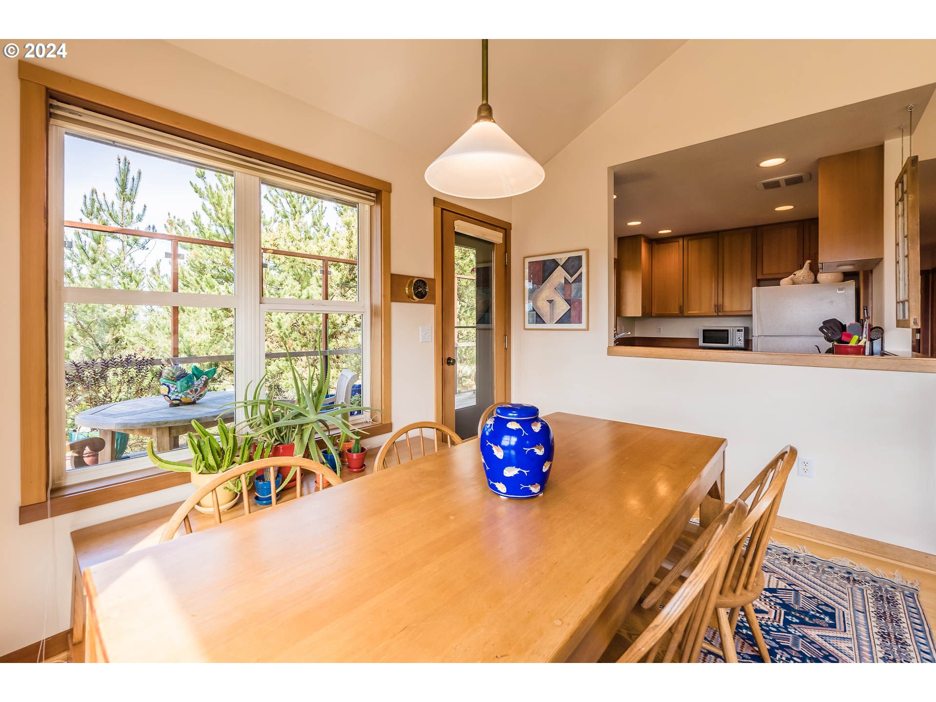 Ridge Road Pacific City, OR 97135 - Photo 18 of 34 a very nice looking dining room with a large window and dining table