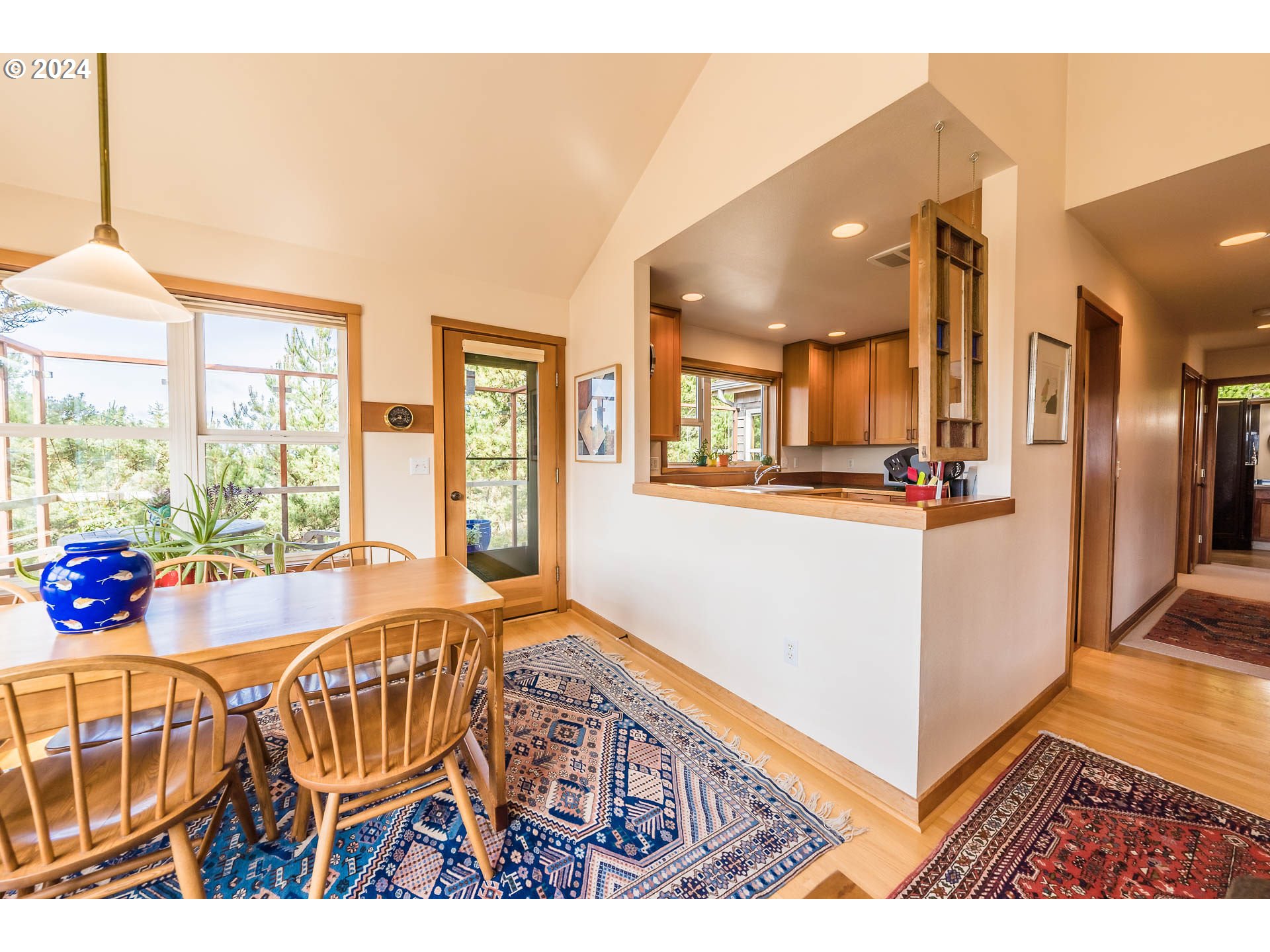 Ridge Road Pacific City, OR 97135 - Photo 20 of 34 a view of a living room and a kitchen