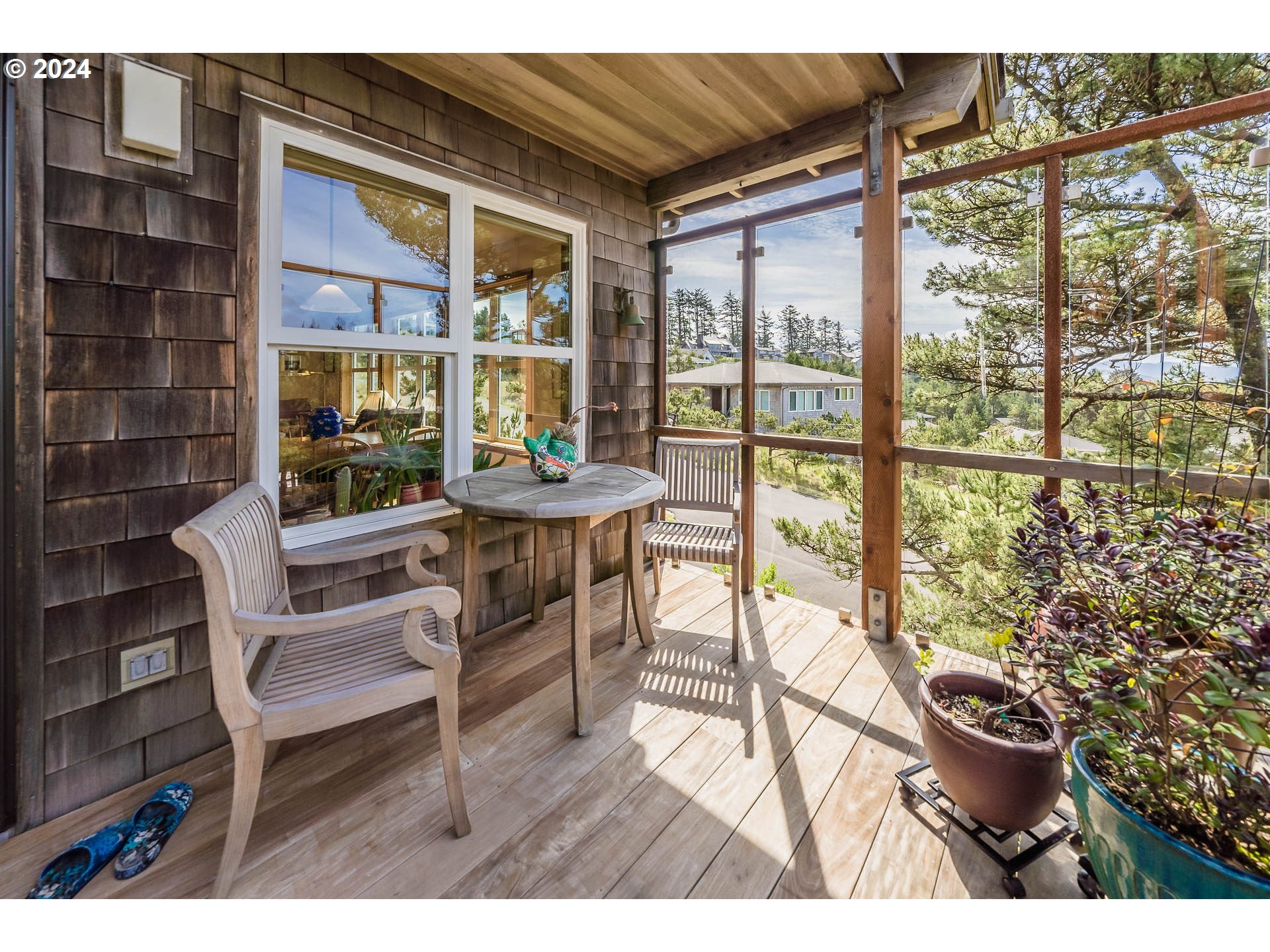 Ridge Road Pacific City, OR 97135 - Photo 21 of 34 a balcony with table and chairs