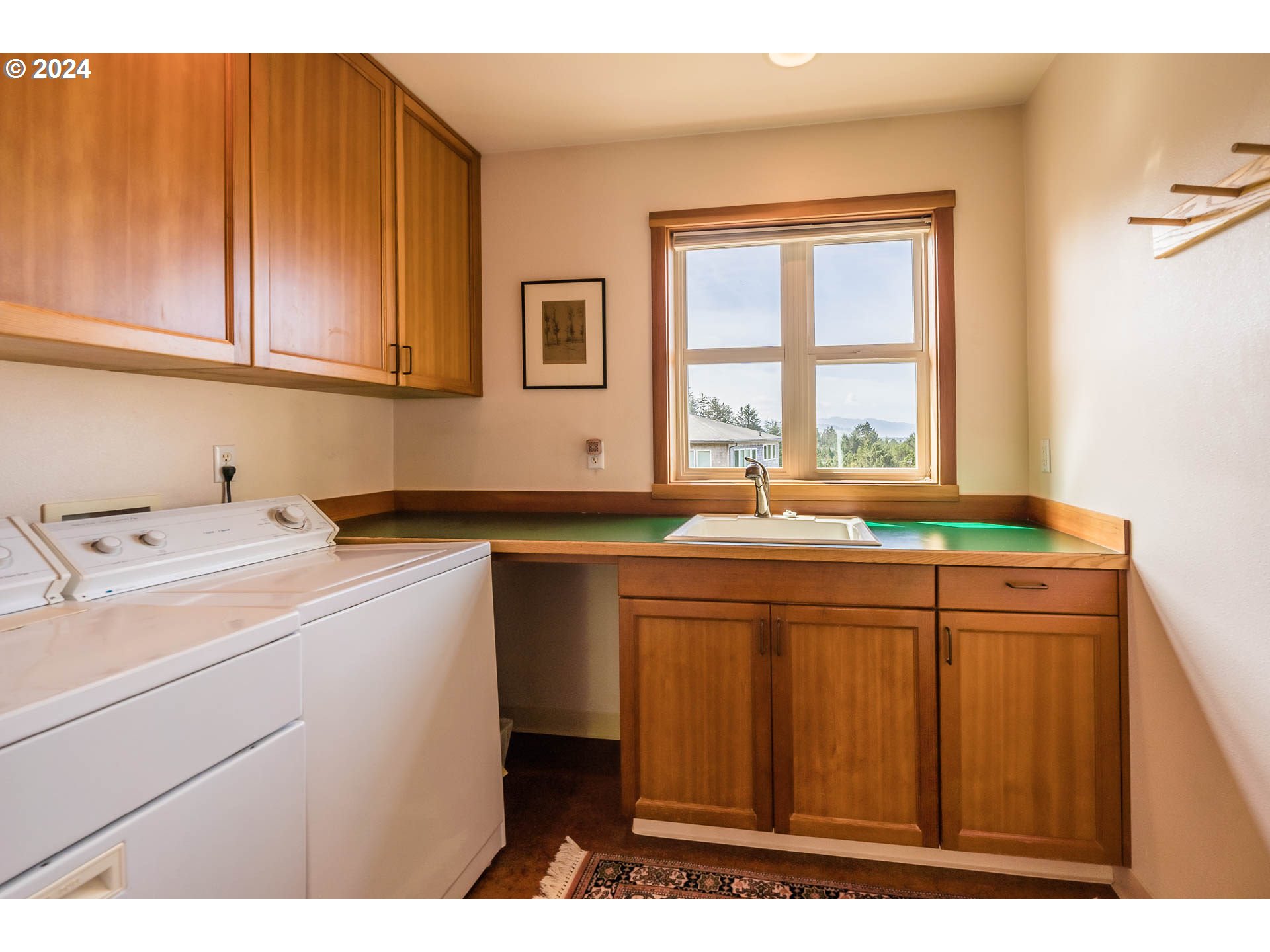Ridge Road Pacific City, OR 97135 - Photo 6 of 34 a utility room with dryer and washer