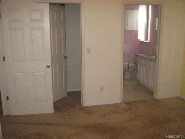 1986 Flagstone Circle, Unit 118 Rochester, MI 48307 - Photo 7 of 11 bed1