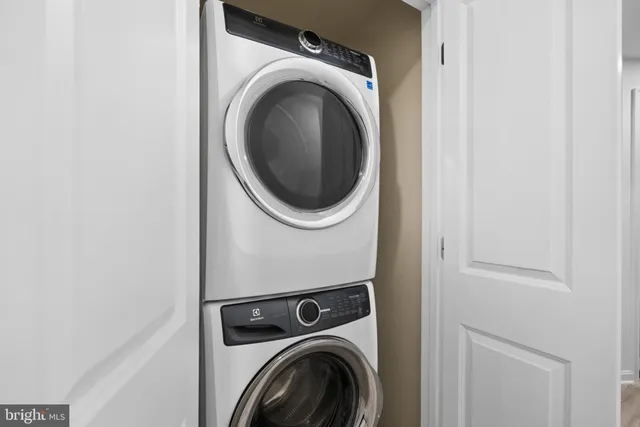 a view of entryway with stairs and wooden floor