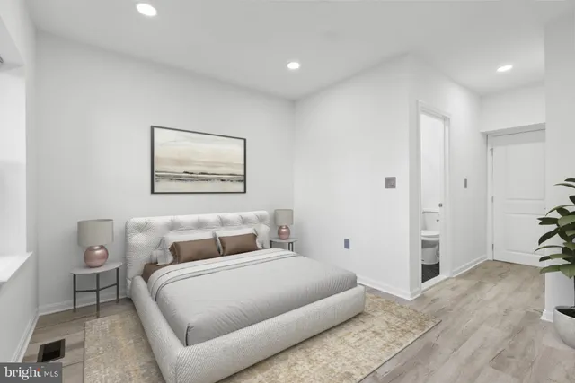 a bathroom with a shower sink and mirror
