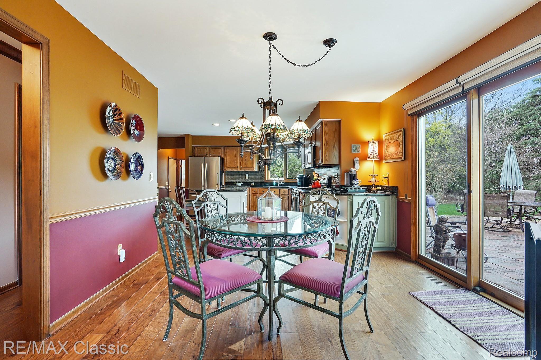 18991 Van Road Livonia, MI 48152 - Photo 25 of 47 Cozy Breakfast Nook - Wood Flooring - Door Wall to Back Yard Patio