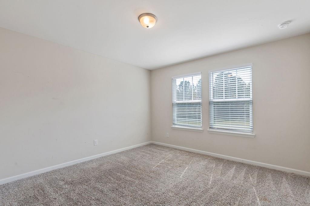 6901 Durham Lane Fairburn, GA 30213 - Photo 18 of 28 an empty room with a window