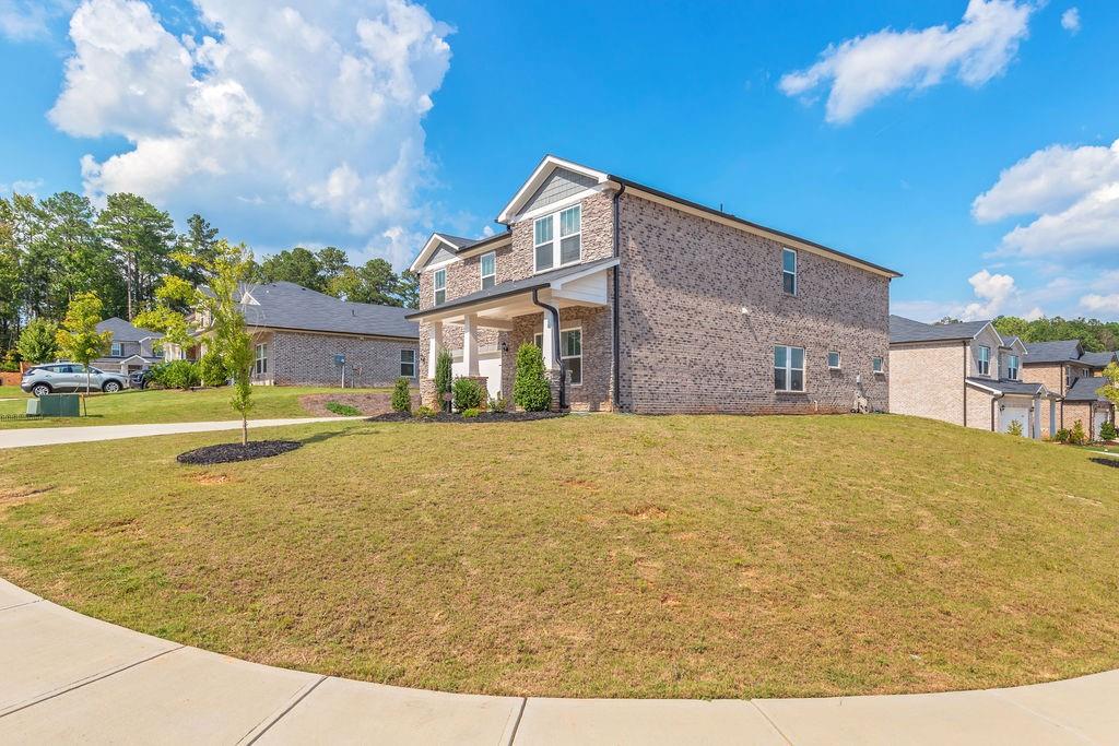 6901 Durham Lane Fairburn, GA 30213 - Photo 2 of 28 a view of a house with a swimming pool