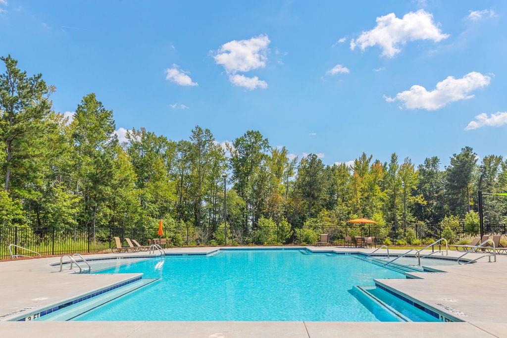 6901 Durham Lane Fairburn, GA 30213 - Photo 26 of 28 a view of a swimming pool with an outdoor seating