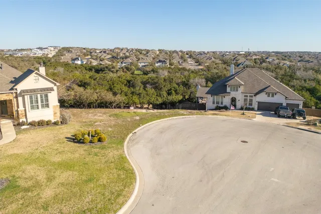 a view of house with yard