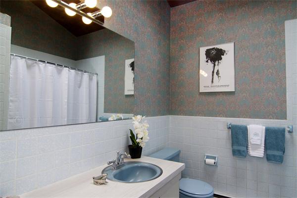 115 Pine Hill Road Boxborough, MA 01719 - Photo 19 of 28 a bathroom with a sink a toilet and a mirror