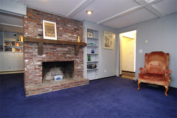 115 Pine Hill Road Boxborough, MA 01719 - Photo 22 of 28 a living room with furniture and a fireplace