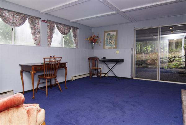 115 Pine Hill Road Boxborough, MA 01719 - Photo 23 of 28 a view of a livingroom with furniture and a window
