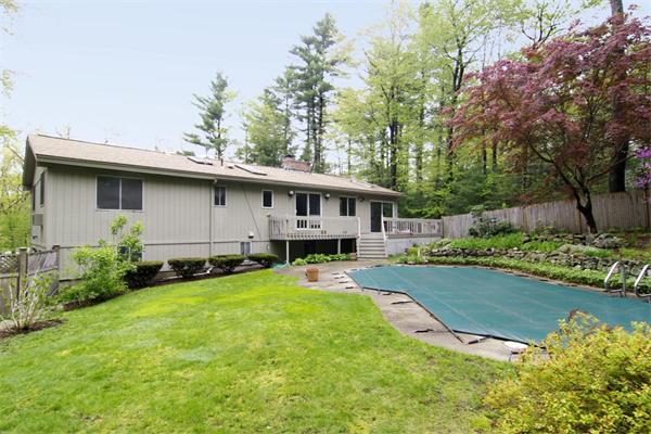 115 Pine Hill Road Boxborough, MA 01719 - Photo 28 of 28 a view of a house with backyard and sitting area