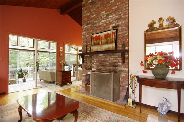 115 Pine Hill Road Boxborough, MA 01719 - Photo 7 of 28 a living room with fireplace furniture and a flat screen tv