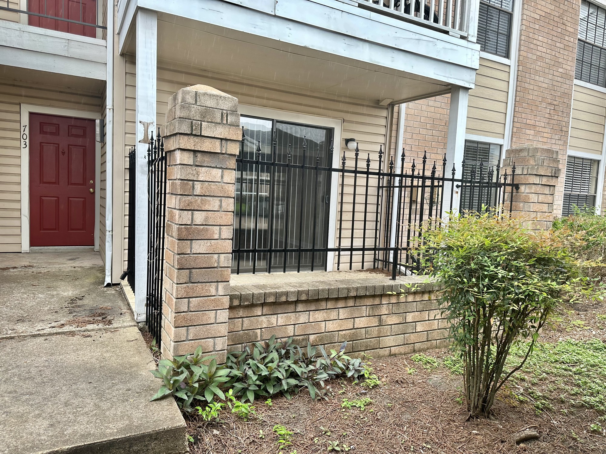 2750 Holly Hall Street, Unit 703 Houston, TX 77054 - Photo 17 of 20 Front view with fenced patio area.