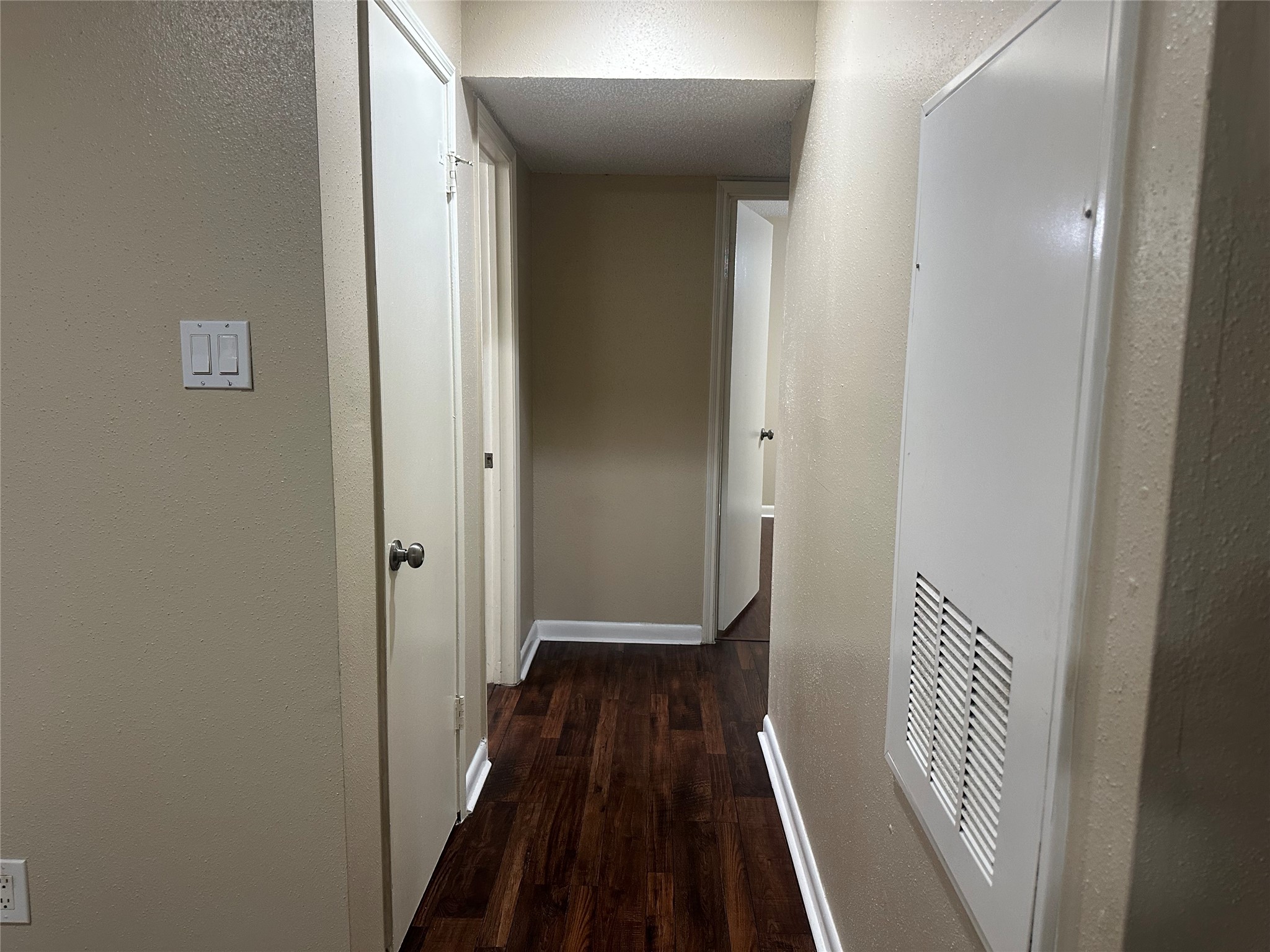 2750 Holly Hall Street, Unit 703 Houston, TX 77054 - Photo 7 of 20 Hallway to bedrooms (storage closet on the left)