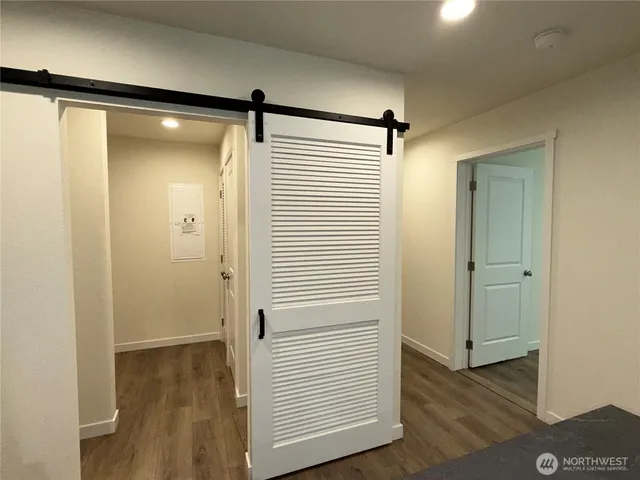 a view of bathroom with a glass door and shower
