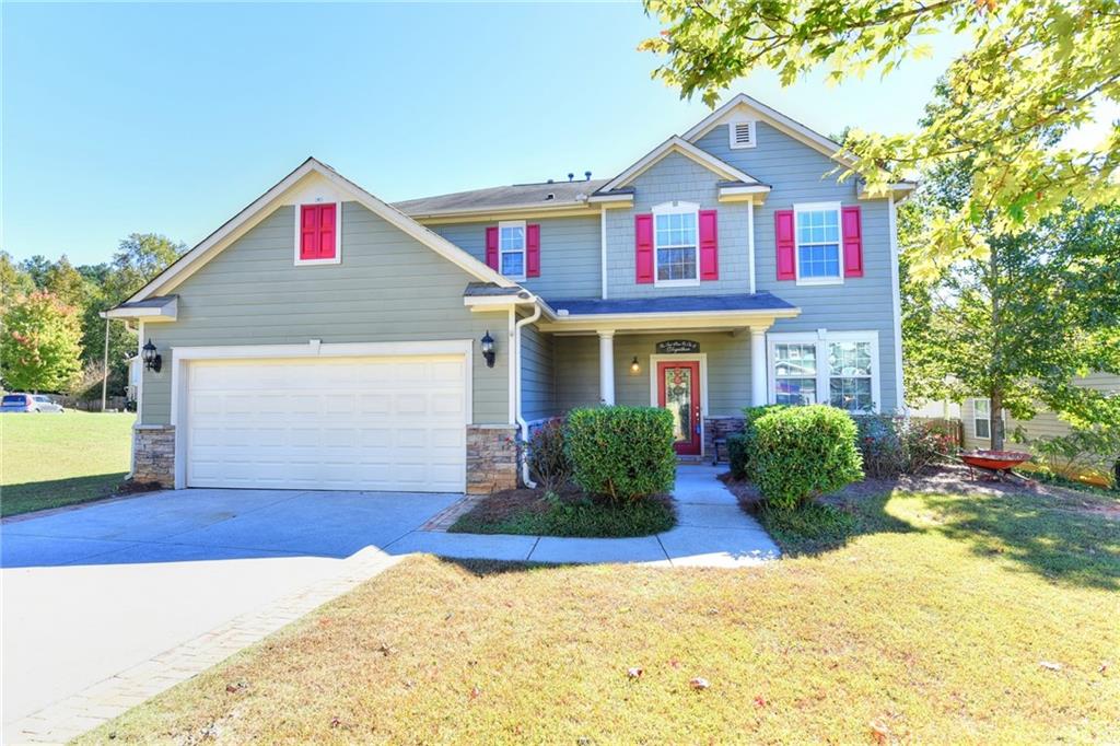 414 Howell Crossing Canton, GA 30115 - Photo 1 of 1 a view of a house with entertaining space