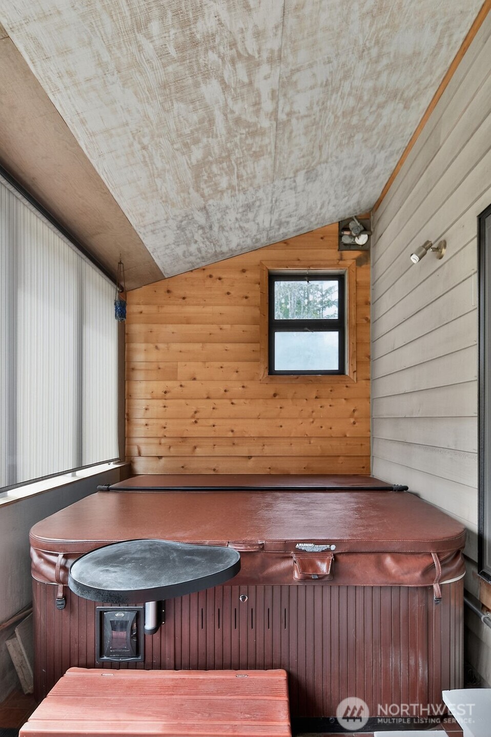 91 Goforth Road West Sequim, WA 98382 - Photo 32 of 40 a view of a patio with a table and chairs