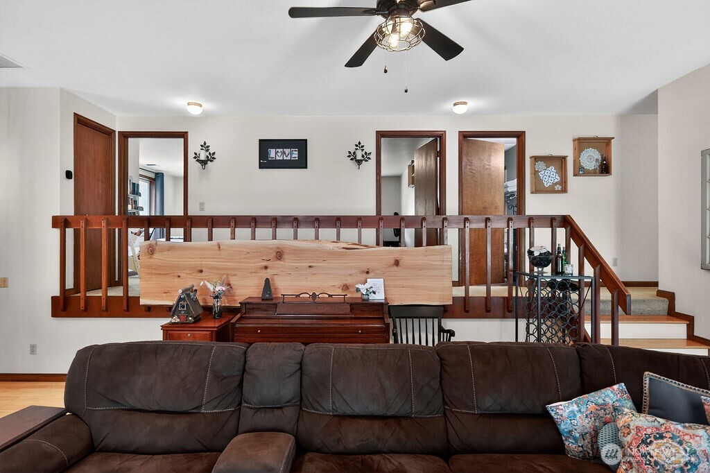91 Goforth Road West Sequim, WA 98382 - Photo 10 of 40 a living room with furniture and wooden floor
