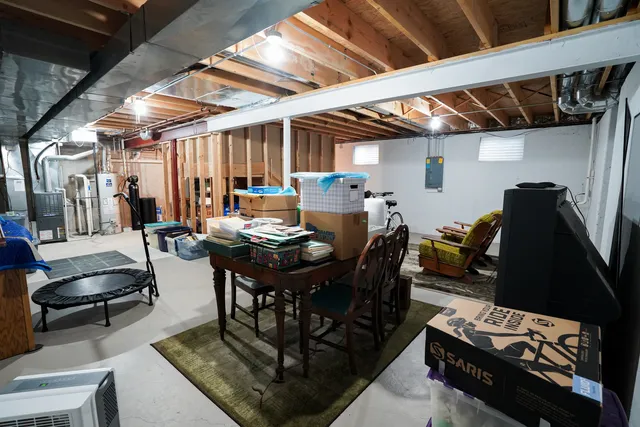 a view of a big dining room with furniture