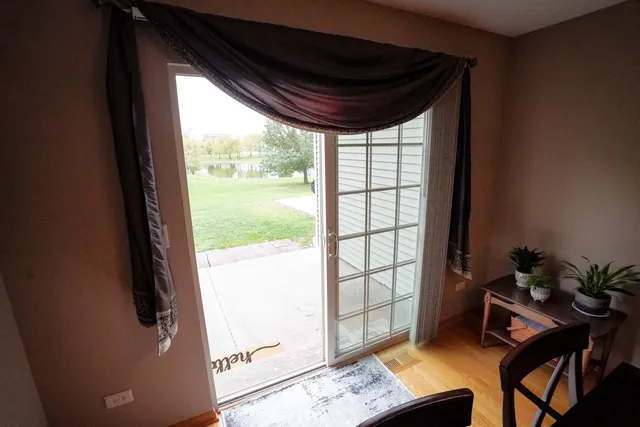 a view of workspace with furniture and window