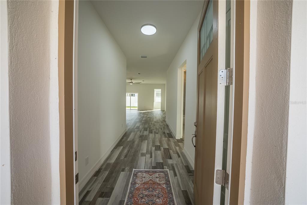 4720 Southeast 25th Street Ocala, FL 34480 - Photo 3 of 27 a view of entryway with livingroom