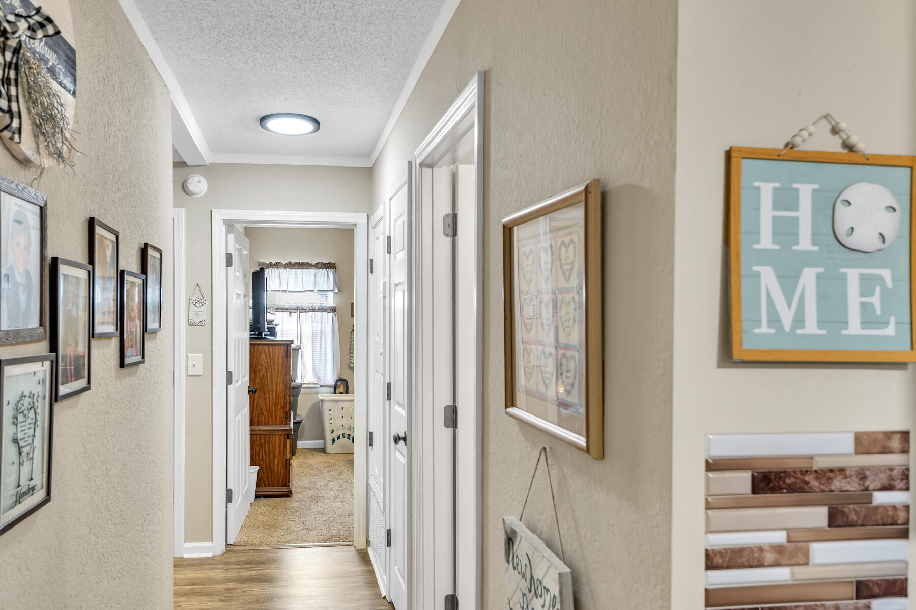 965 Valley Road Crestview, FL 32539 - Photo 12 of 35 a view of a hallway with interior of the house