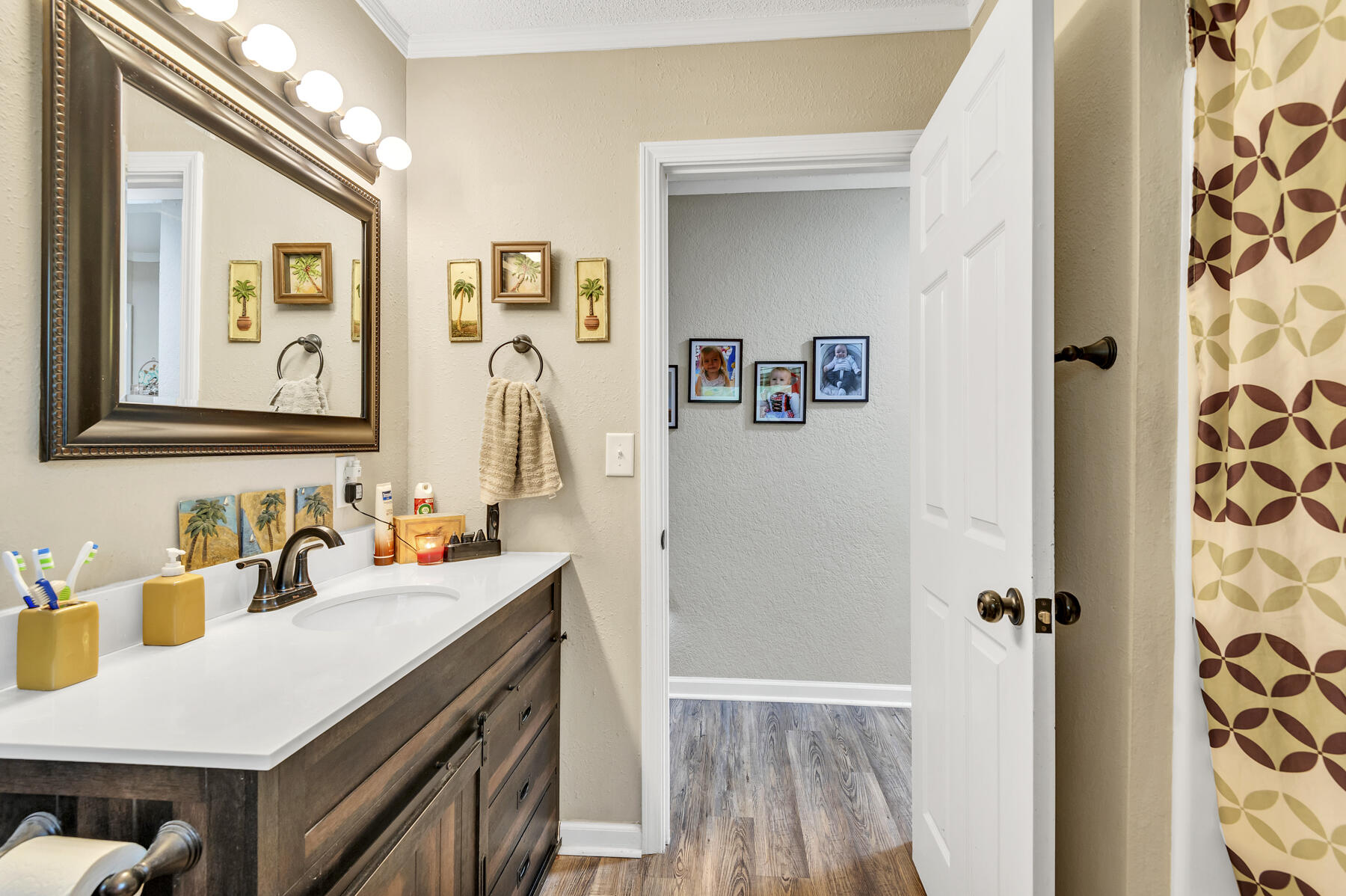 965 Valley Road Crestview, FL 32539 - Photo 16 of 35 a bathroom with a sink and a mirror