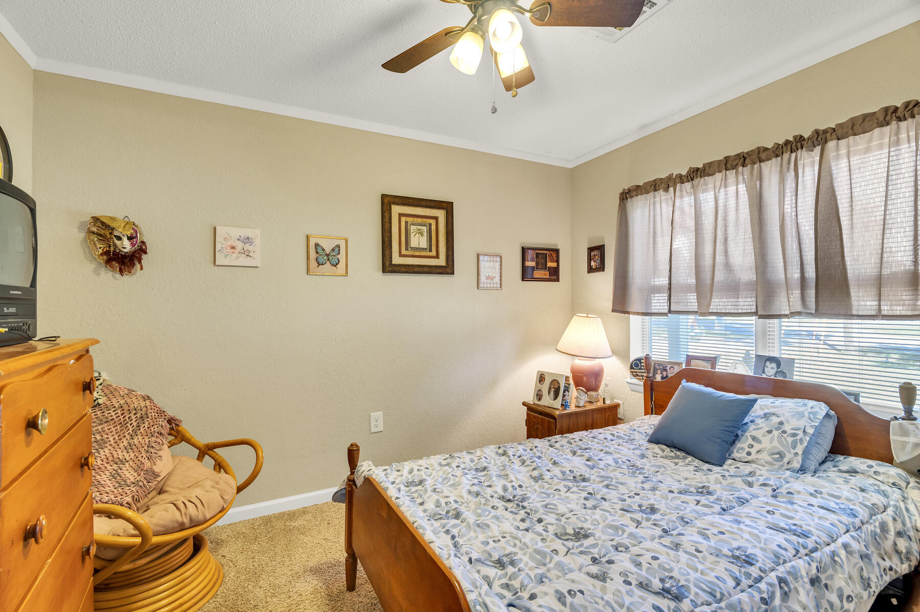 965 Valley Road Crestview, FL 32539 - Photo 17 of 35 a bedroom with a bed and wooden floor
