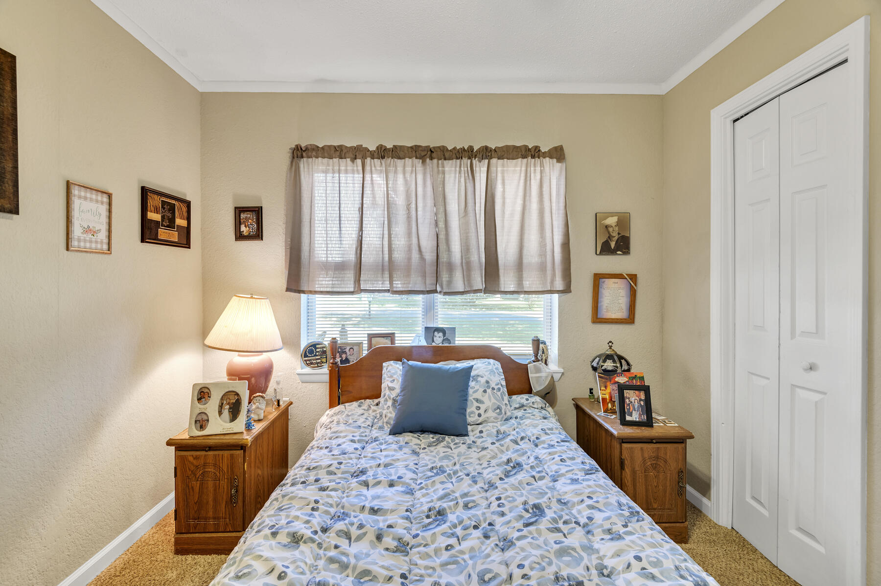 965 Valley Road Crestview, FL 32539 - Photo 18 of 35 a bed room with a bed and furniture