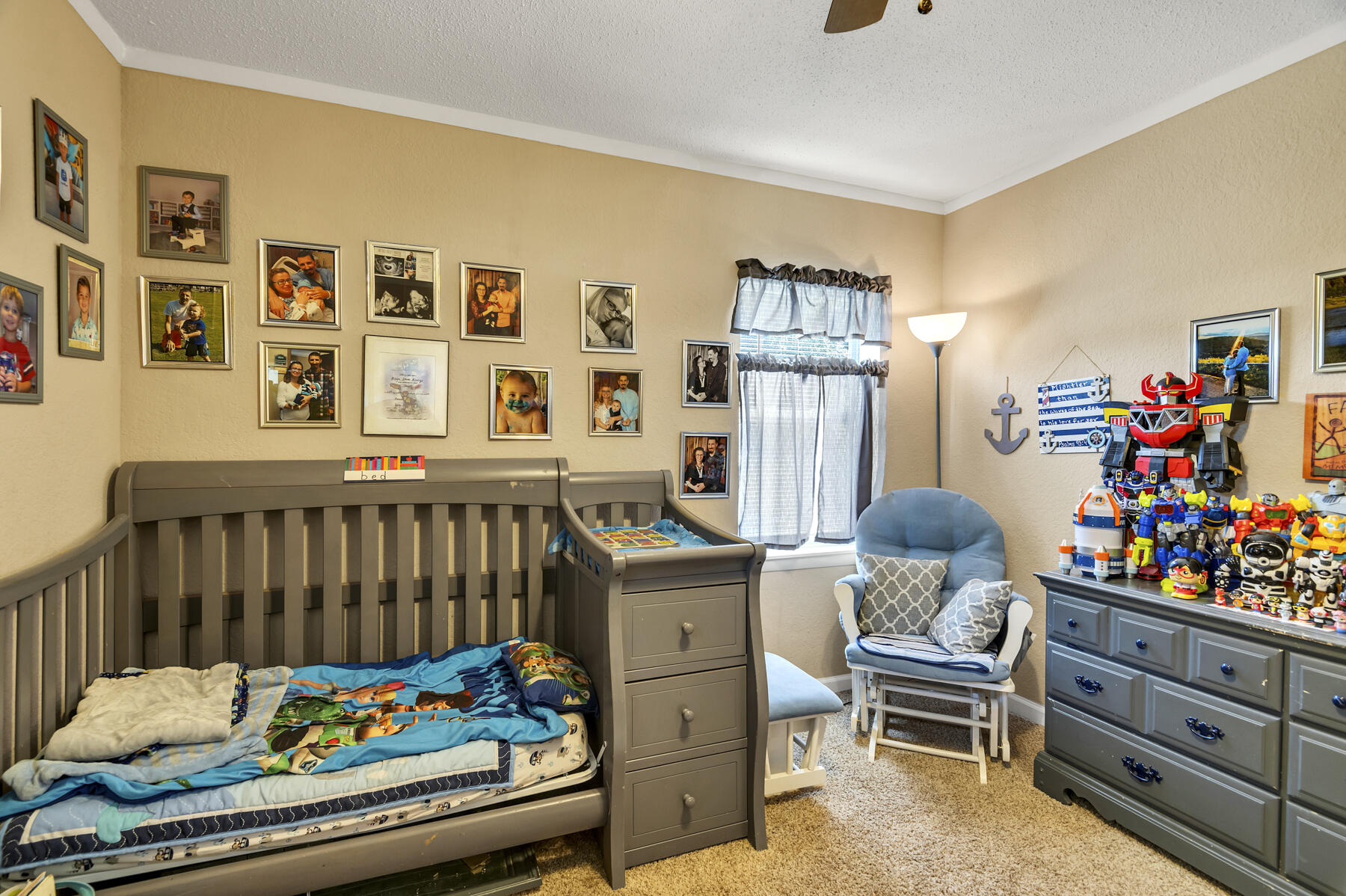965 Valley Road Crestview, FL 32539 - Photo 21 of 35 a bedroom with furniture and a baby crib