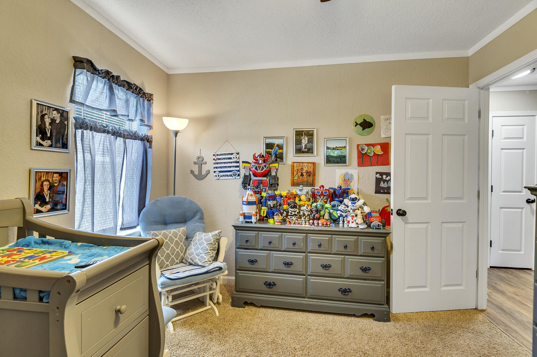 965 Valley Road Crestview, FL 32539 - Photo 22 of 35 a view of a kitchen with fridge and workspace