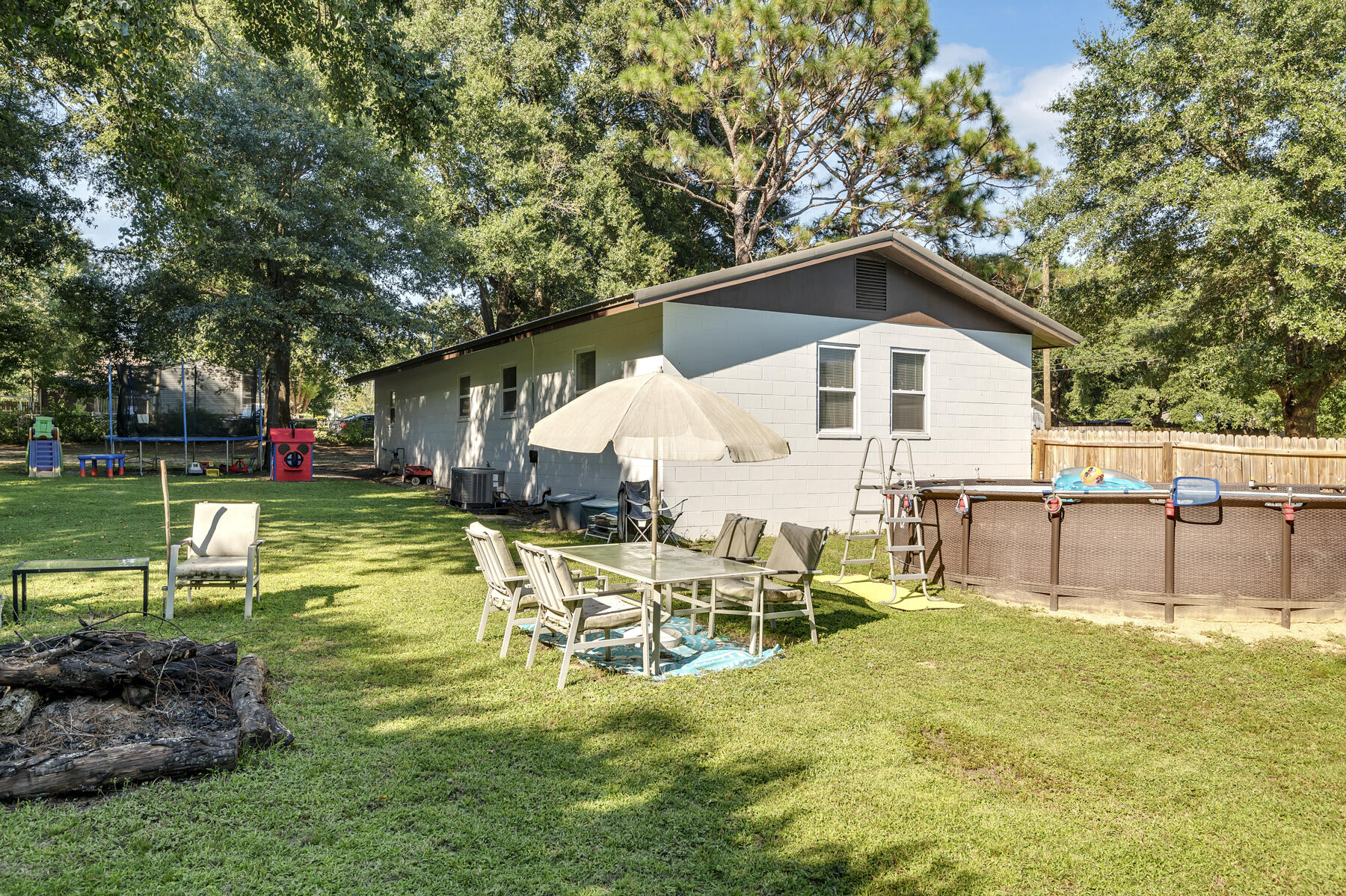 965 Valley Road Crestview, FL 32539 - Photo 27 of 35 a view of a house with a yard patio and swimming pool