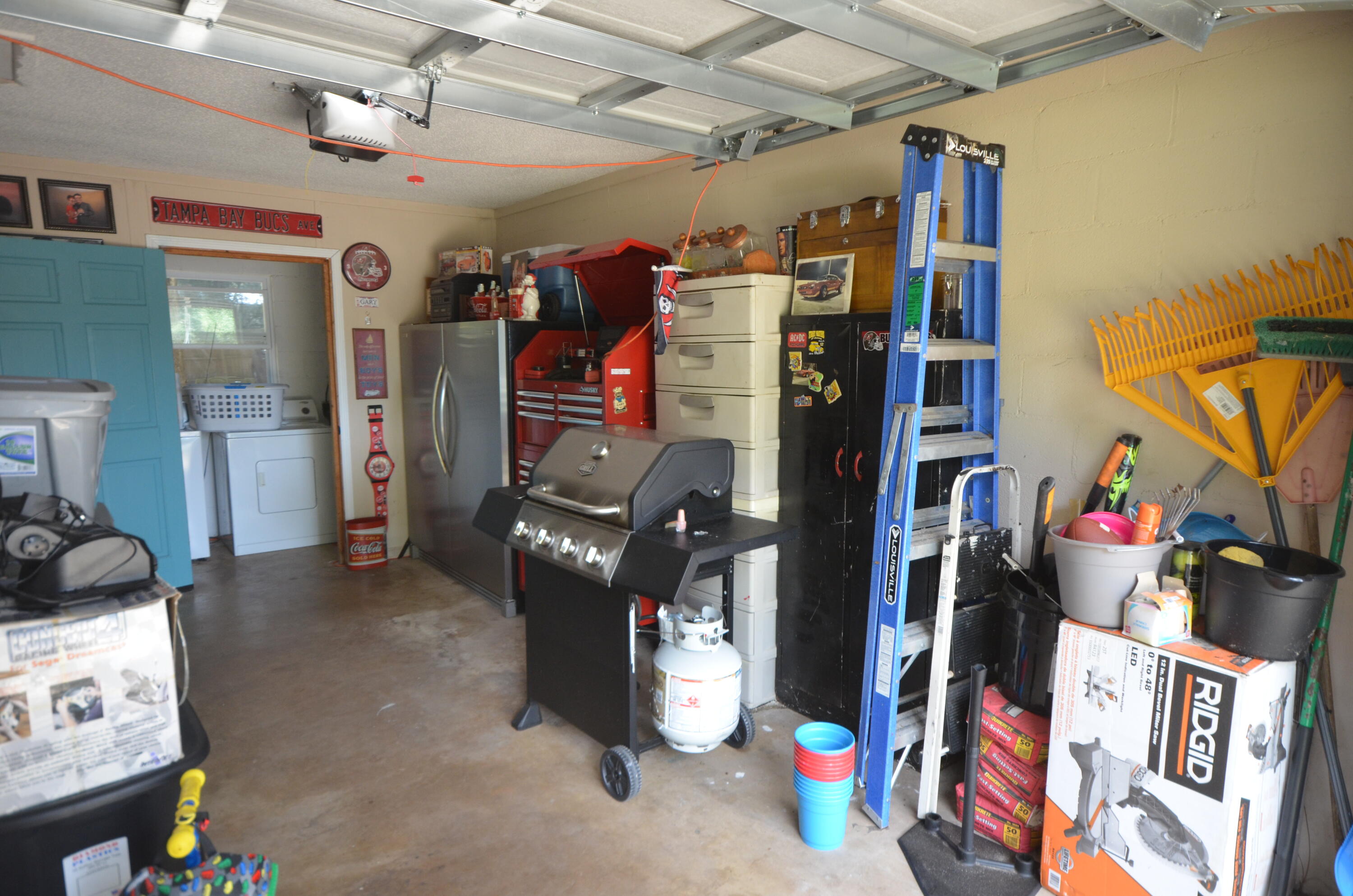 965 Valley Road Crestview, FL 32539 - Photo 33 of 35 a view of a storage room with water heater and stuff