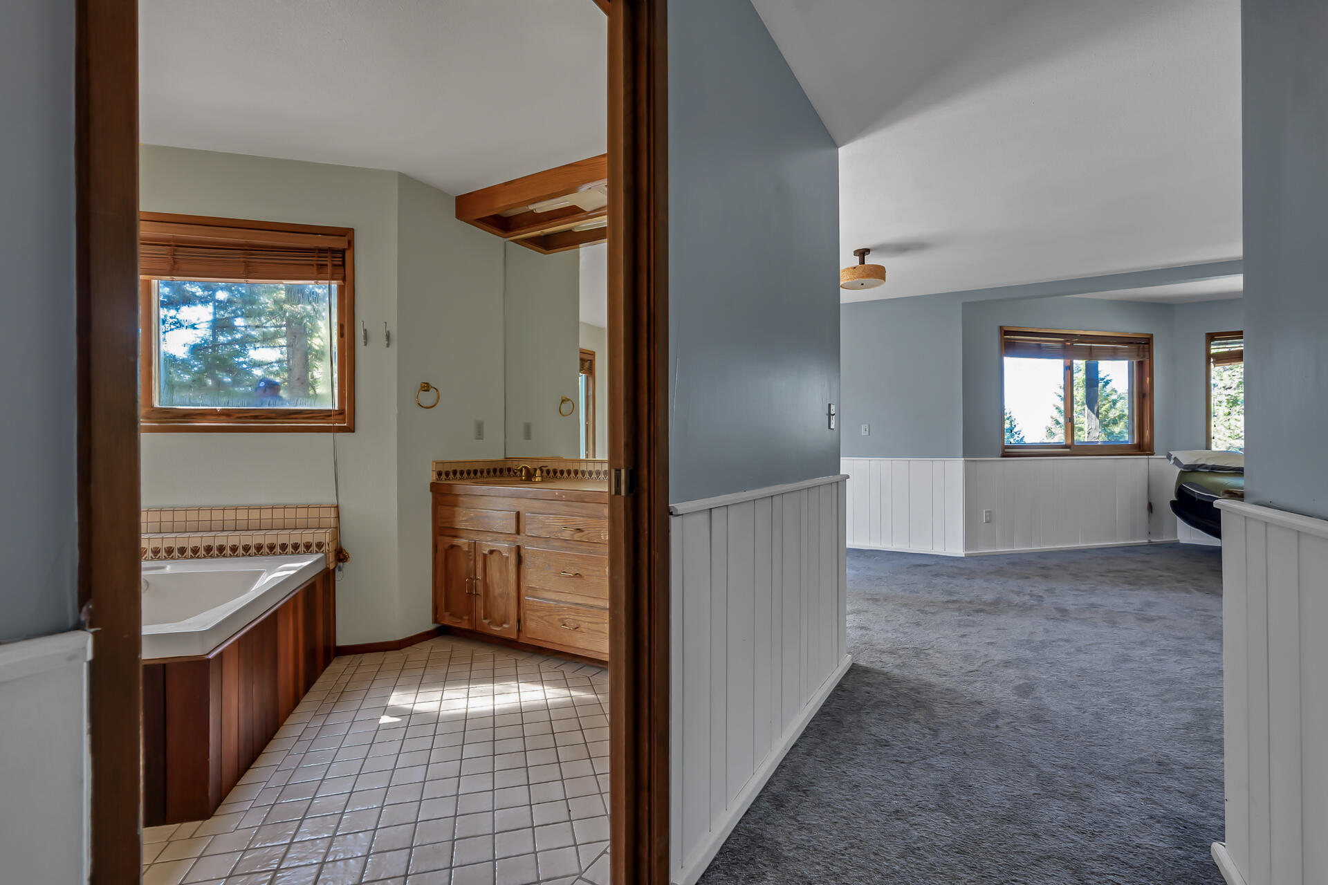 15368 Star Flower Road Oak Run, CA 96069 - Photo 52 of 63 a view of a kitchen with a sink dishwasher and wooden floor