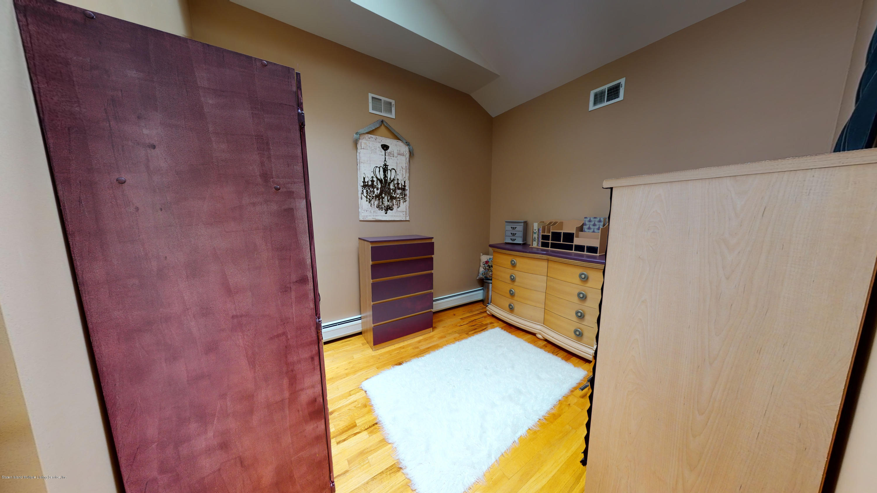 103 Covington Circle Staten Island, NY 10312 - Photo 12 of 21 a room with storage and utility