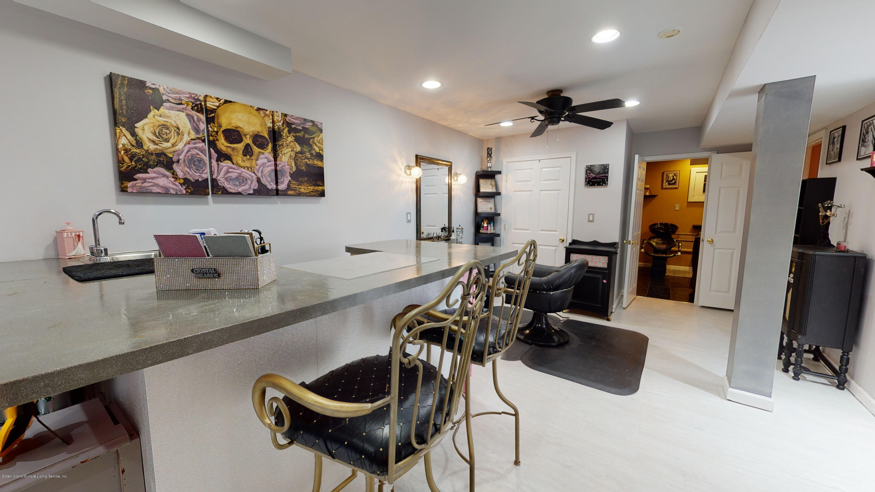 103 Covington Circle Staten Island, NY 10312 - Photo 14 of 21 a view of a livingroom with furniture and a flat screen tv