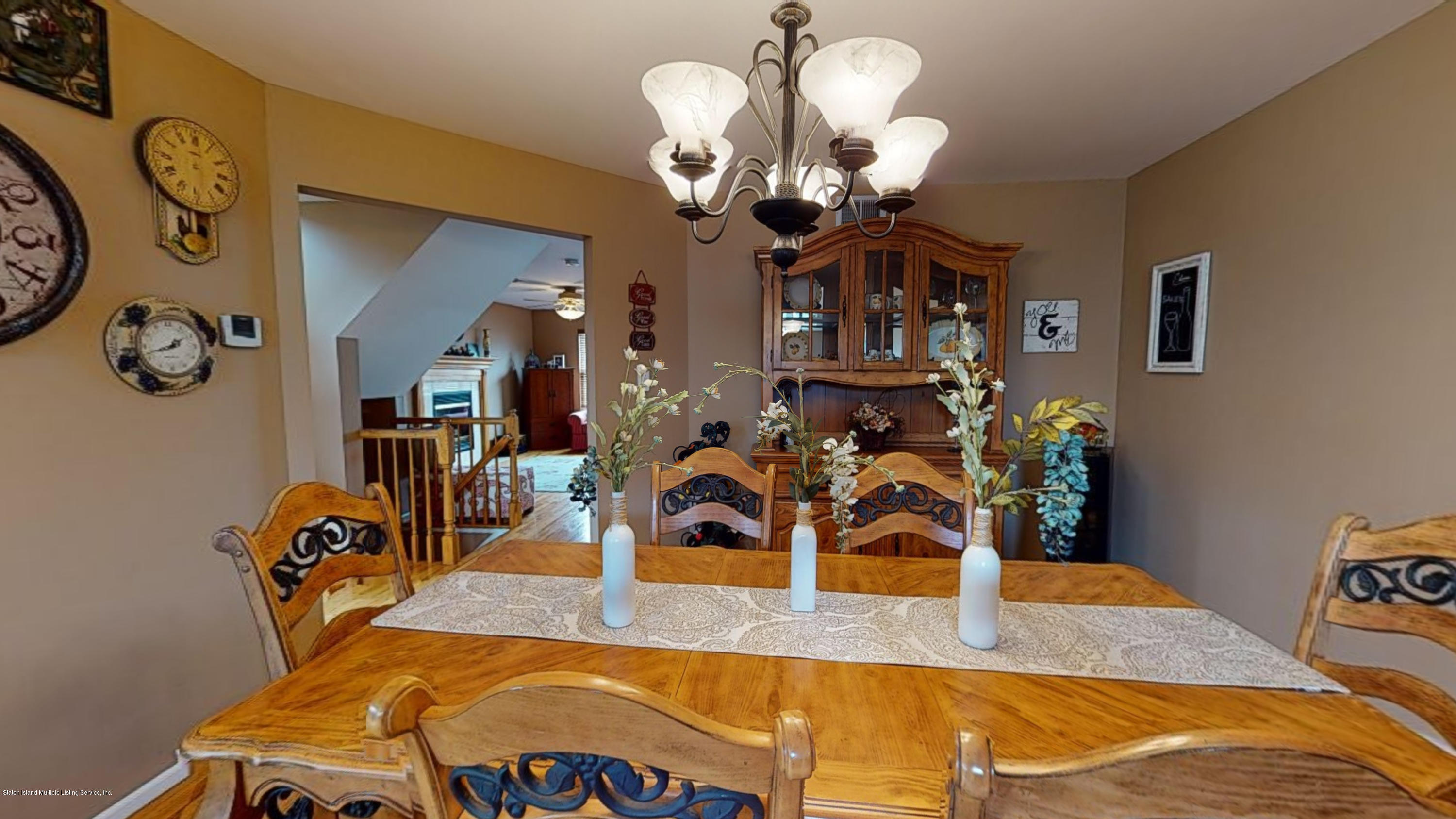 103 Covington Circle Staten Island, NY 10312 - Photo 4 of 21 a view of a dining room with furniture