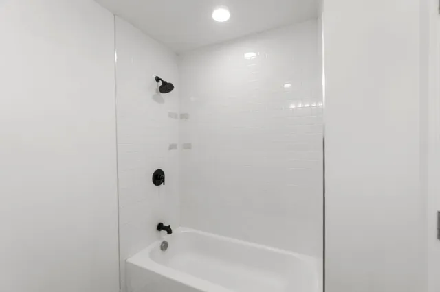 a bathroom with a bathtub